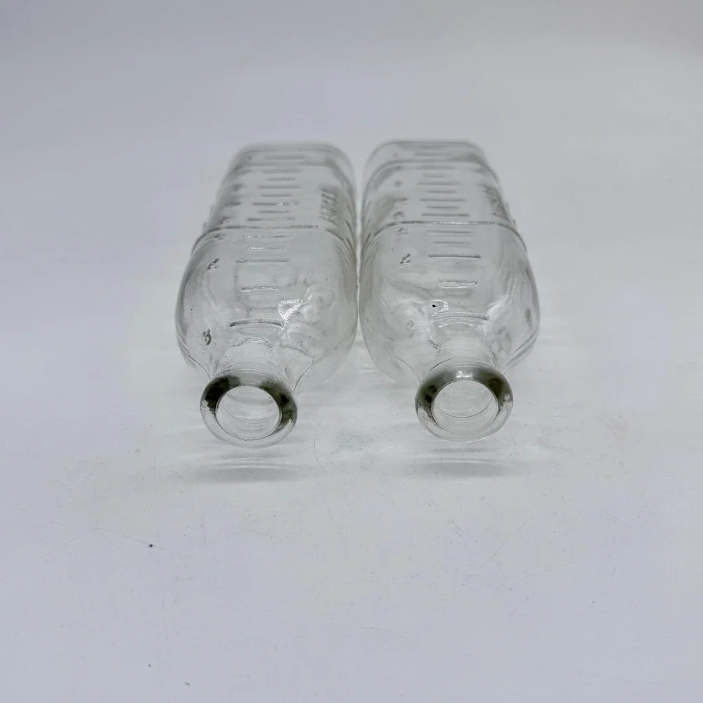 Vintage Embossed Glass‎ Milk Bottle Dog and Rabbit Scene Set of 2
